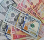انخفاض طفيف بأسعار الدولار في العراق