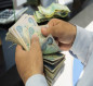 الأزمة المالية تتفاقم.. الحكومة تسحب مبالغ من "الأمانات الضريبية" لتمويل رواتب المواظفين